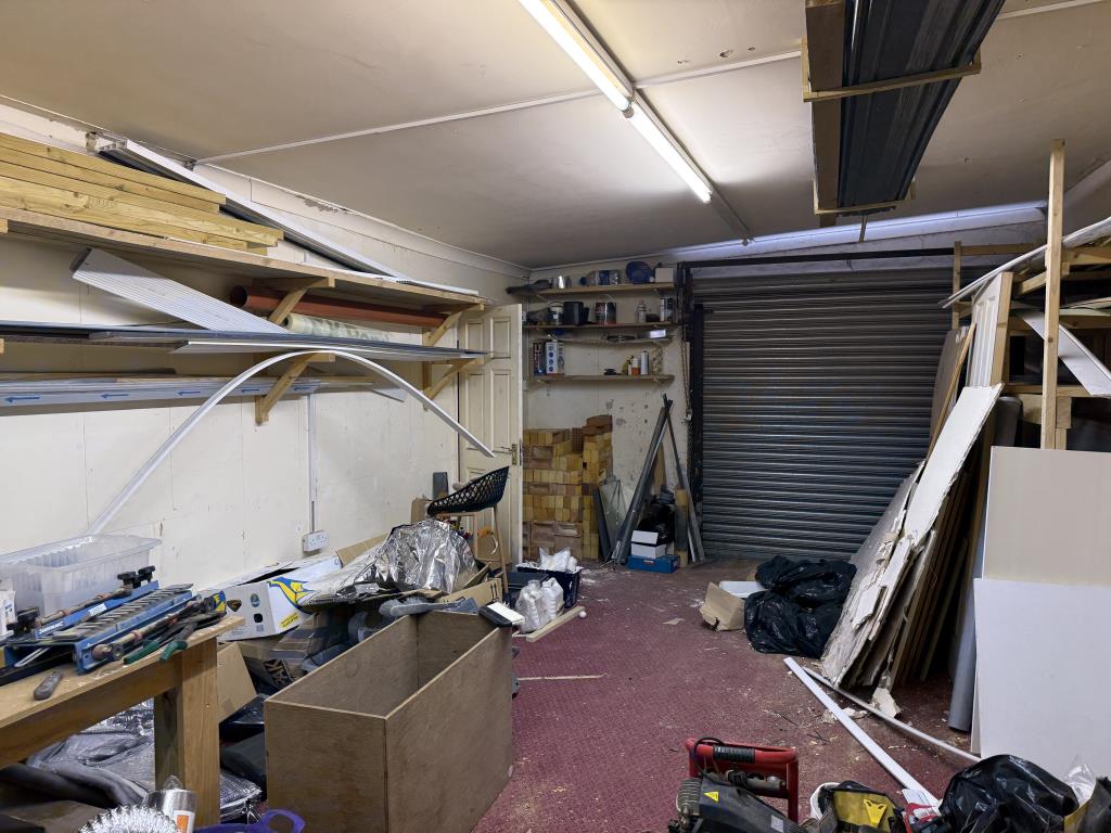 Lot: 45 - MIXED USE FREEHOLD BUILDING - garage store to the rear of the property
